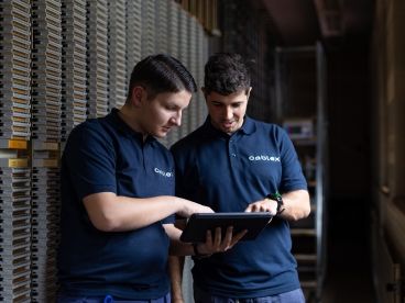 Two cablex technicians in the control centre with iPad in hand